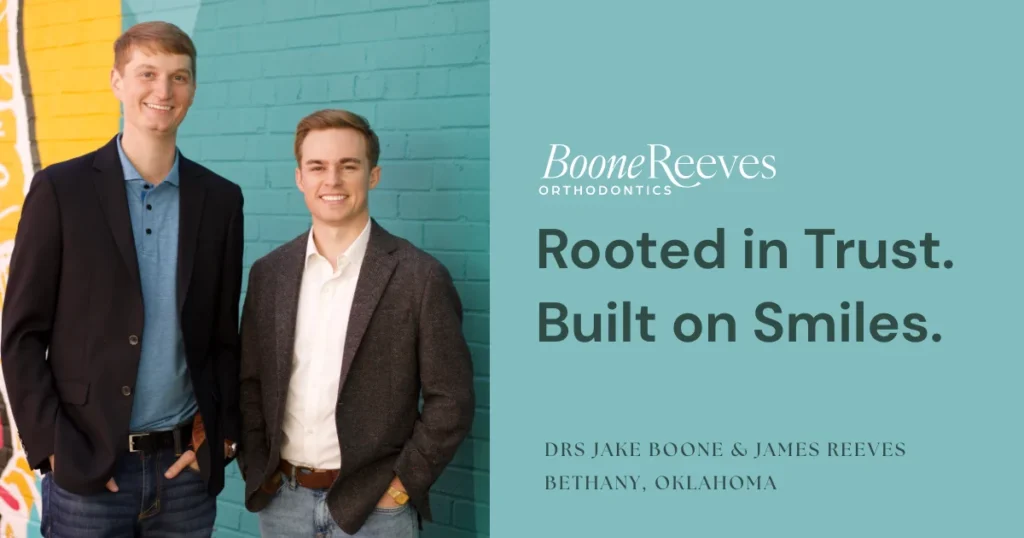 Drs Jake Boone and James Reeves smiling in blazers beside tagline "Rooted in Trust. Built on Smiles."